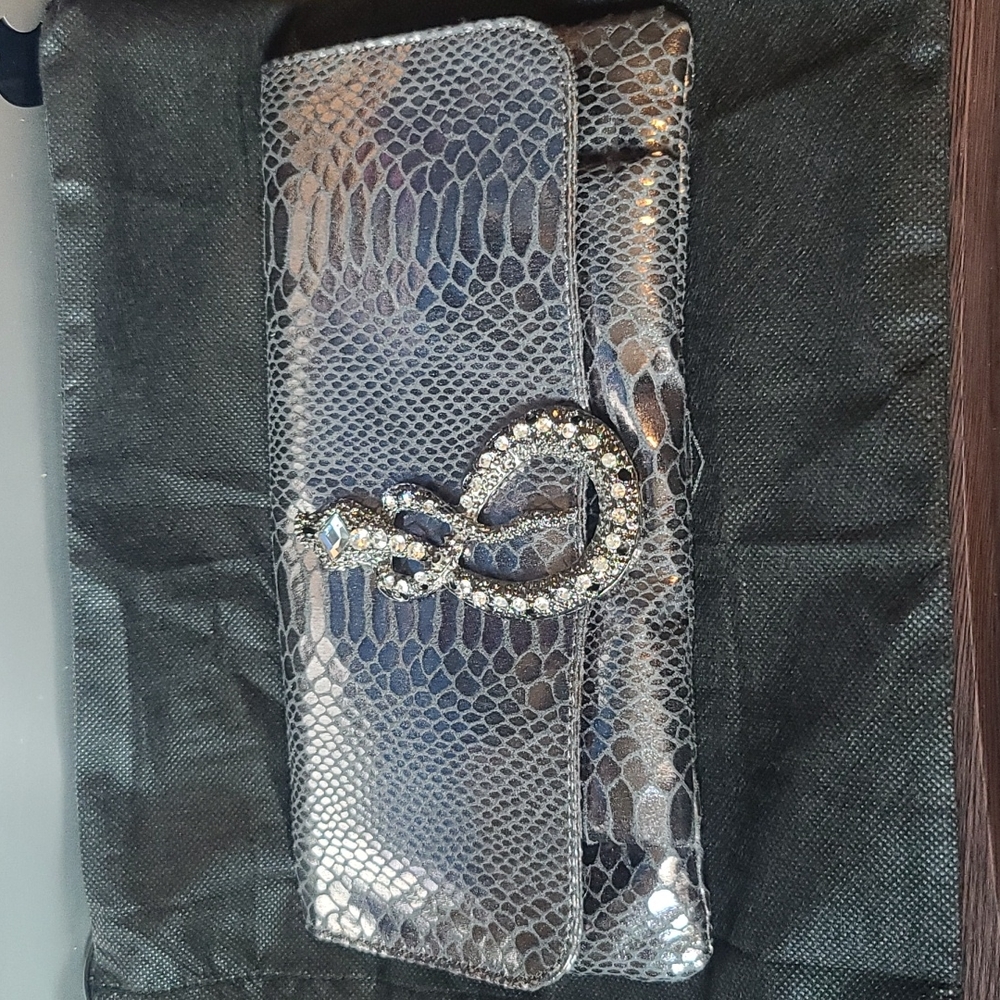 Paula Abdul snake purse